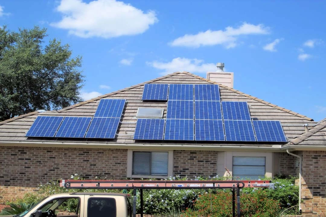 A San Antonio home with solar panels across its tile roof