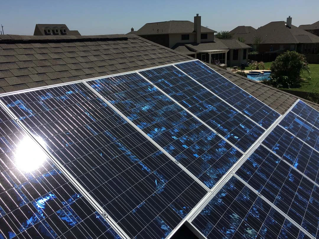 Sunlight on a newly installed rooftop solar array