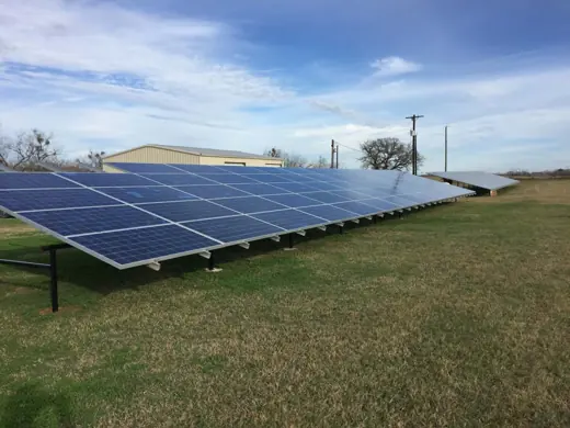 A completed ground-mount solar installation by Advanced Solar, photo 10