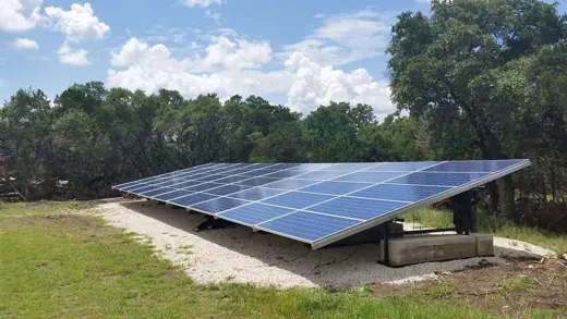 A completed ground-mount solar installation by Advanced Solar, photo 6