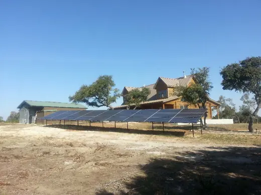 A completed ground-mount solar installation by Advanced Solar, photo 8
