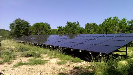 A completed ground-mount solar installation by Advanced Solar, photo 9